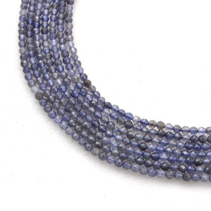 Natural blue iolite faceted round beads strand - front view violet blue