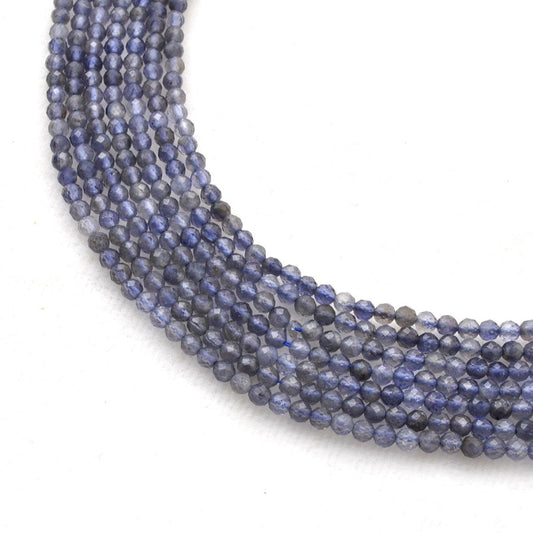 Natural blue iolite faceted round beads strand - front view violet blue