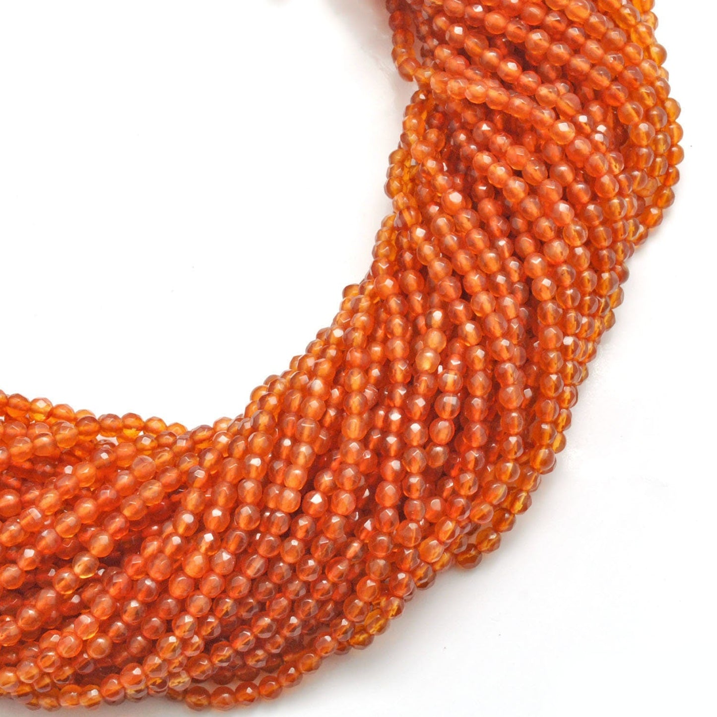 Natural carnelian round beads strand - overhead flat lay view