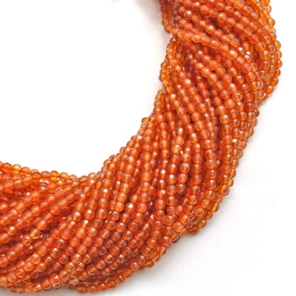 Natural carnelian round beads strand - overhead flat lay view
