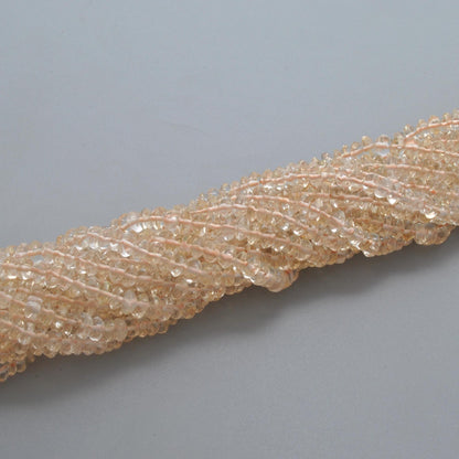 Natural citrine button beads 14 inch strand - overhead flat lay