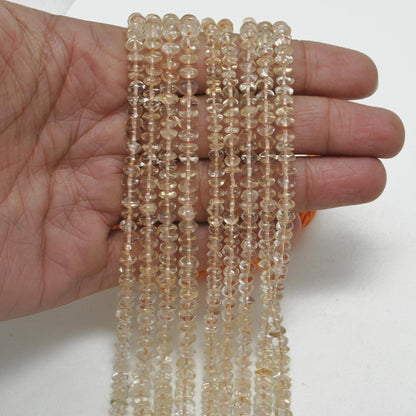 Natural citrine plain button beads 14 inch strand - front view golden