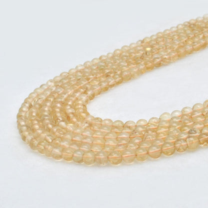 Natural citrine plain round beads 13.5 inch strand - front view golden