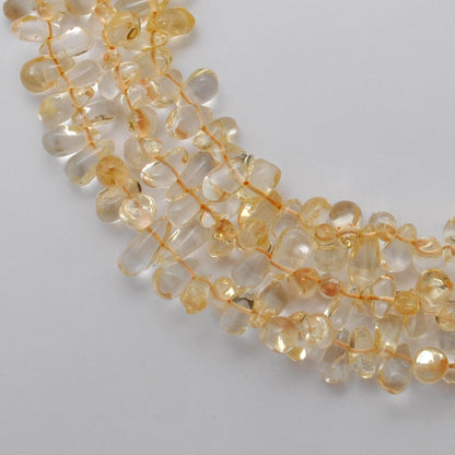 Natural citrine plain teardrop beads 16 inch strand - front view golden
