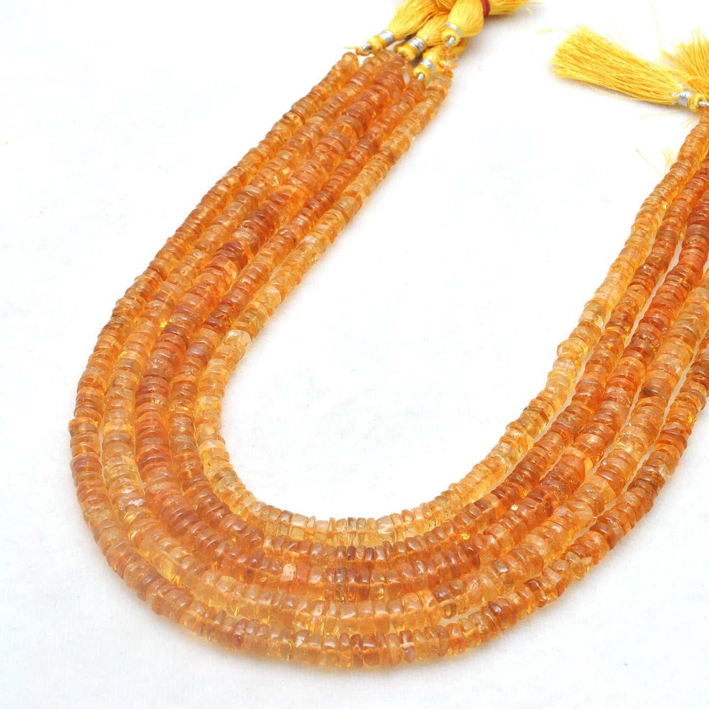 Natural citrine plain tyre beads 16 inch strand - front view golden