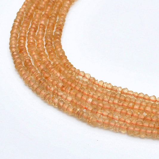 Natural citrine rondelle faceted beads 3-3.5mm - front view golden strand