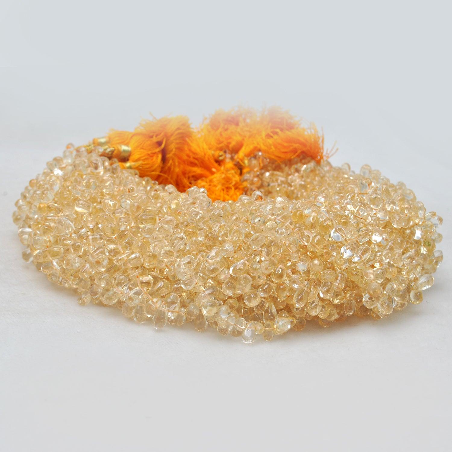 Natural citrine teardrop beads 16 inch - overhead flat lay