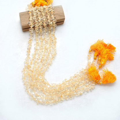 Natural citrine teardrop beads November birthstone - scale