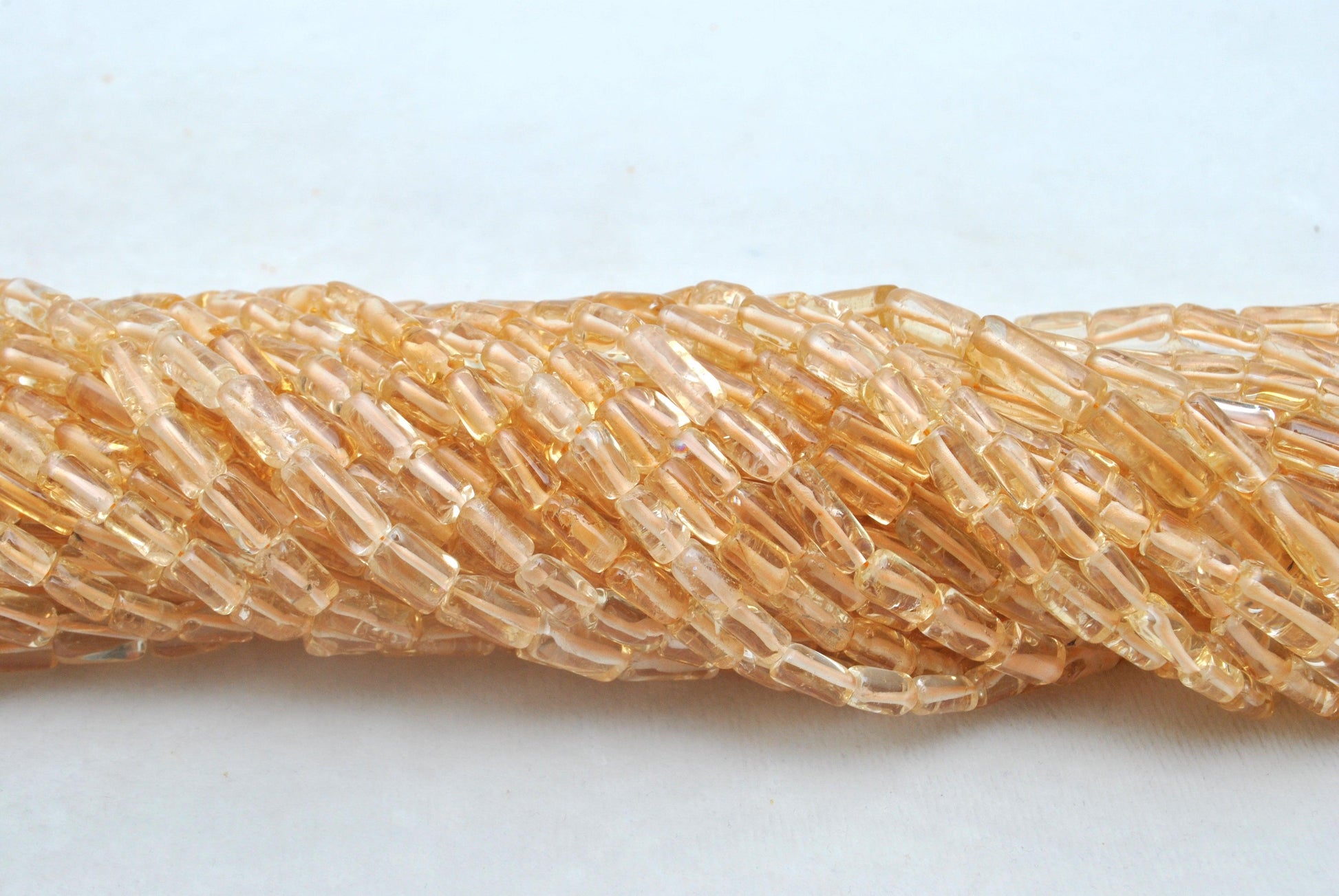 Natural citrine tube beads November birthstone - scale reference