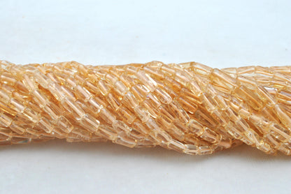 Natural citrine tube beads November birthstone - scale reference