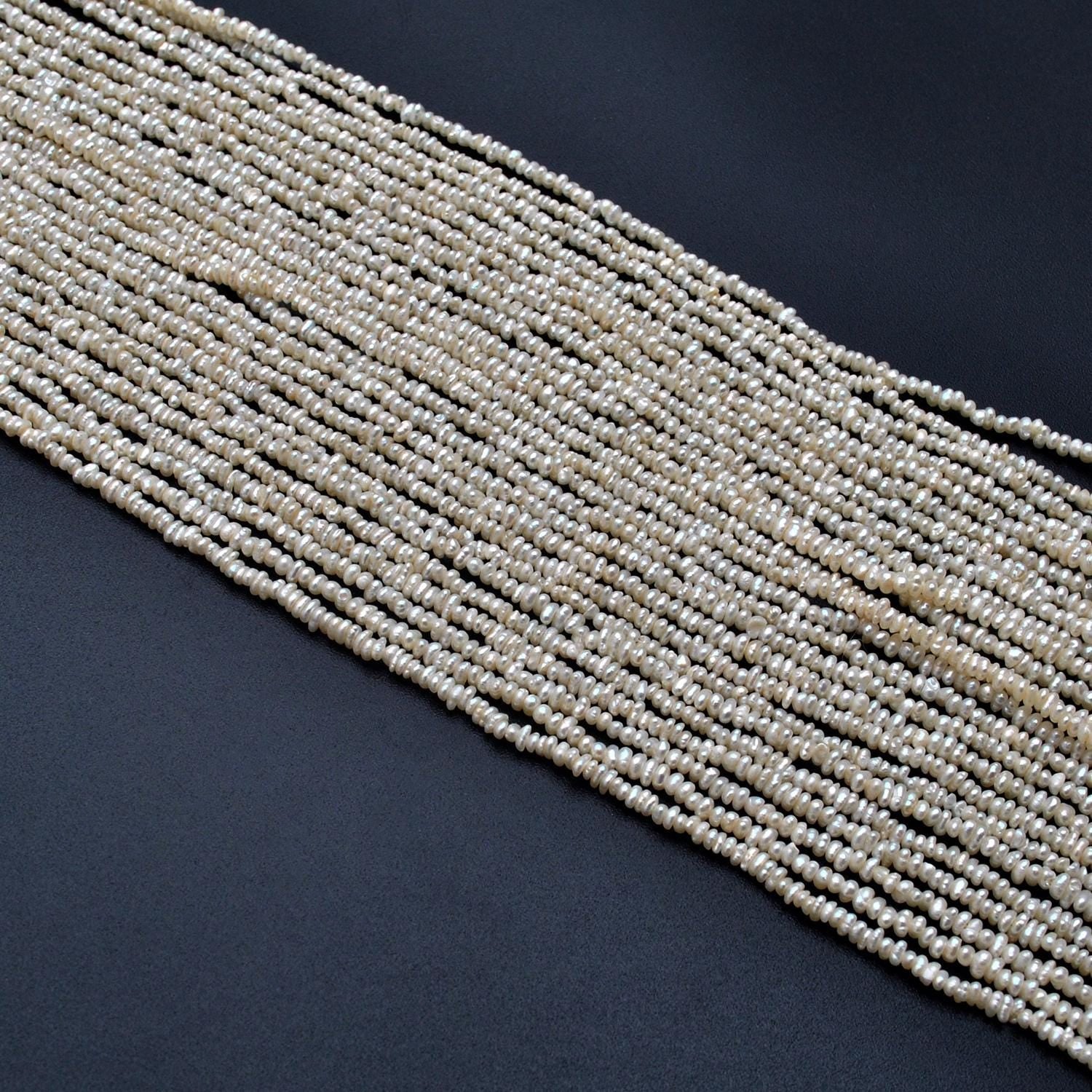 Natural freshwater pearl rondelle beads 2mm 15 inch strand - front view