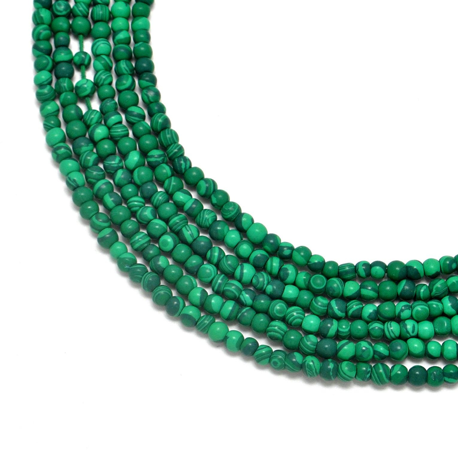 Natural green malachite rondelle beads 12.5 inch strand - front view banding