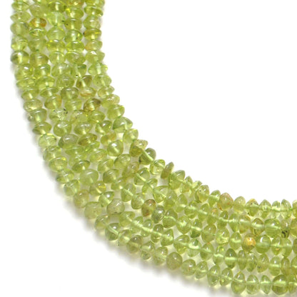 Natural green peridot plain button beads 5-6mm 15 inch - front view