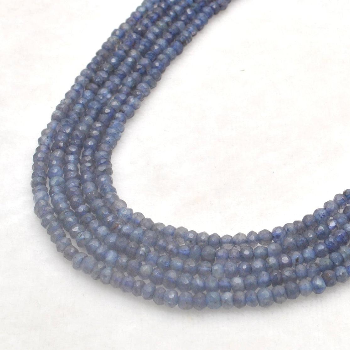 Natural iolite rondelle beads 3mm 4mm strand - front view violet blue