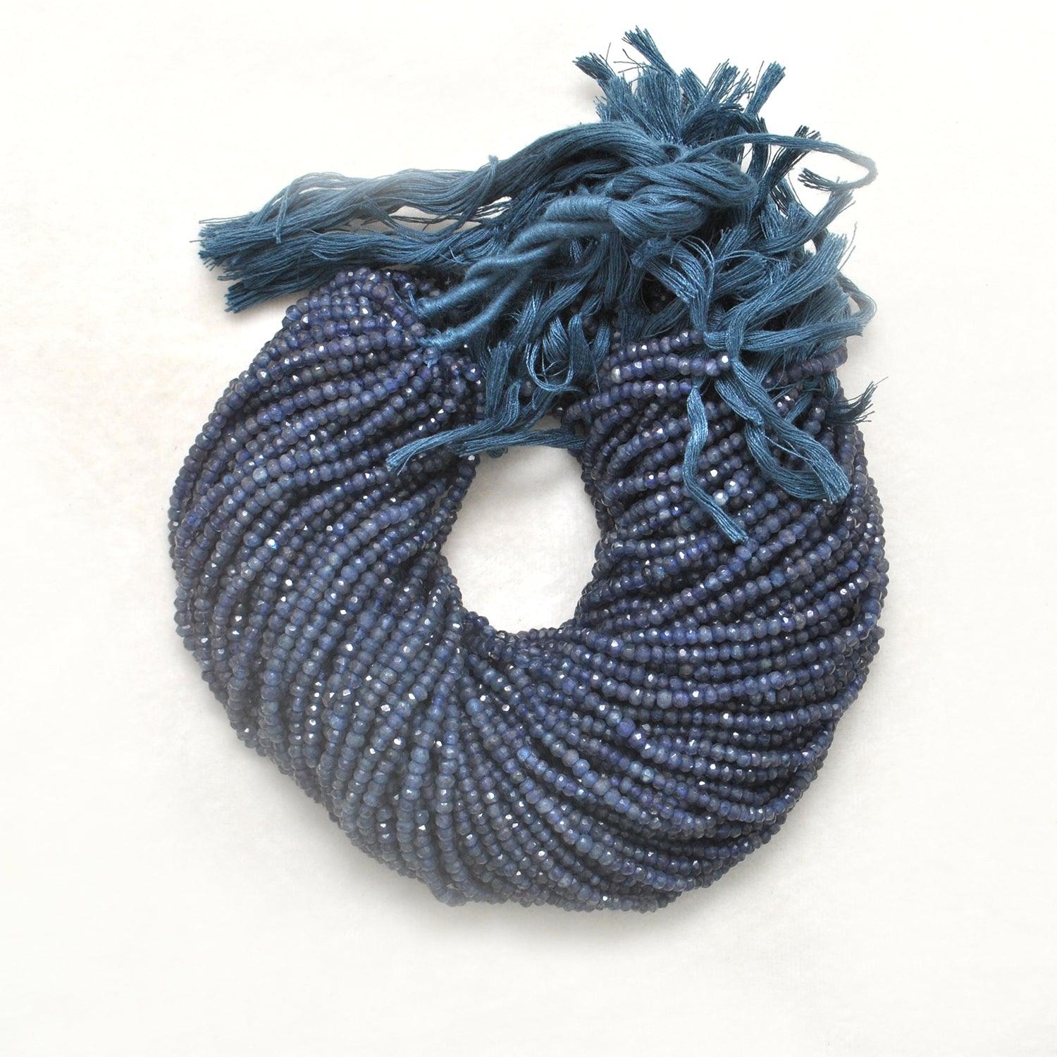 Natural iolite rondelle beads strand - overhead flat lay dainty