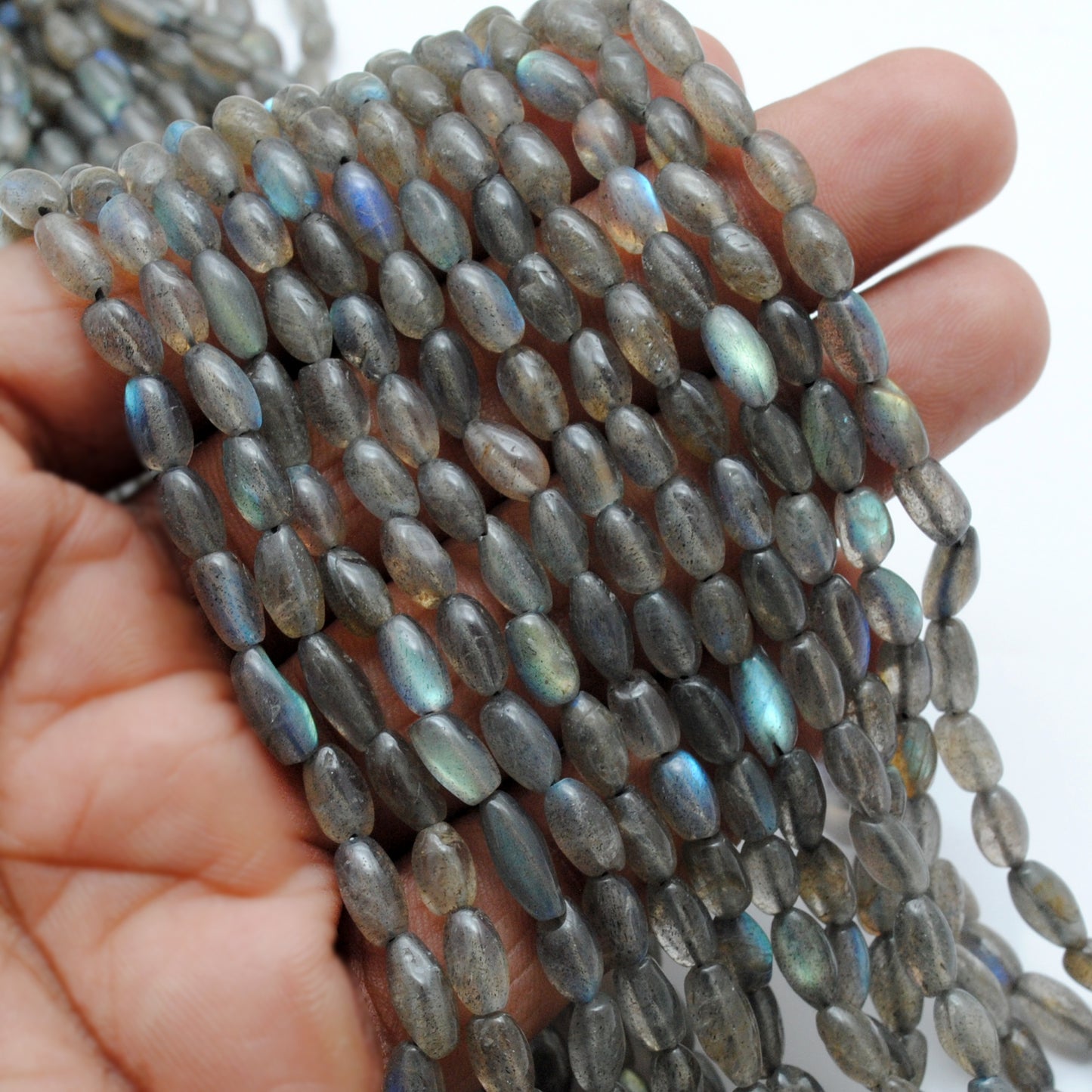 Natural labradorite drum beads scattered loose - multicolour flash