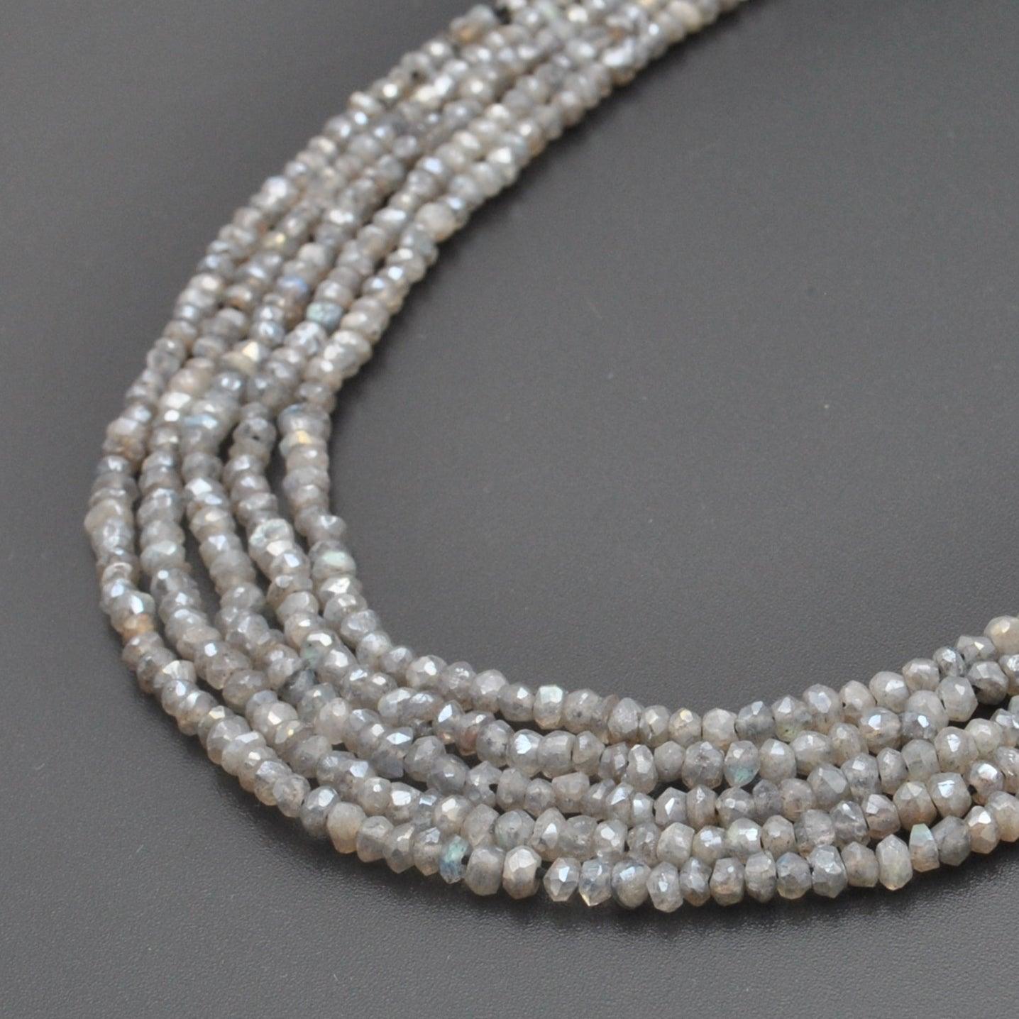 Natural labradorite rondelle faceted beads 13 inch strand - front view flash