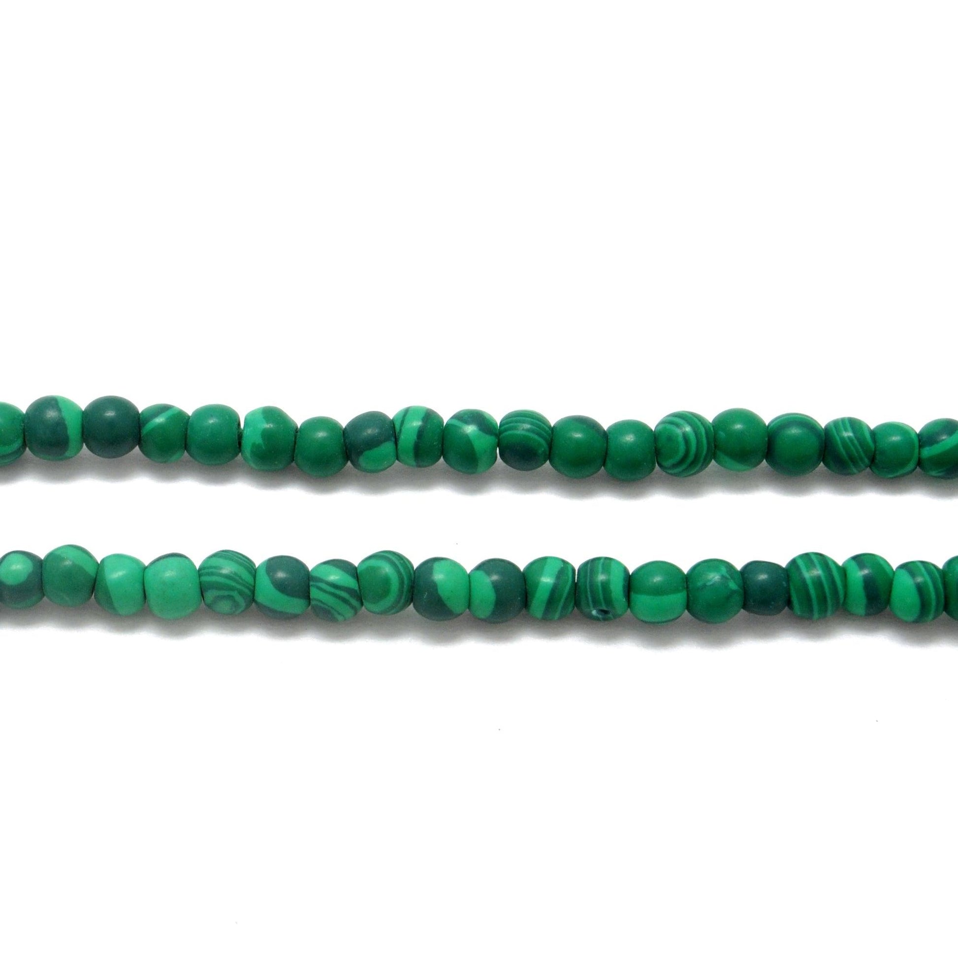 Natural malachite beads for DIY jewelry making - scale reference