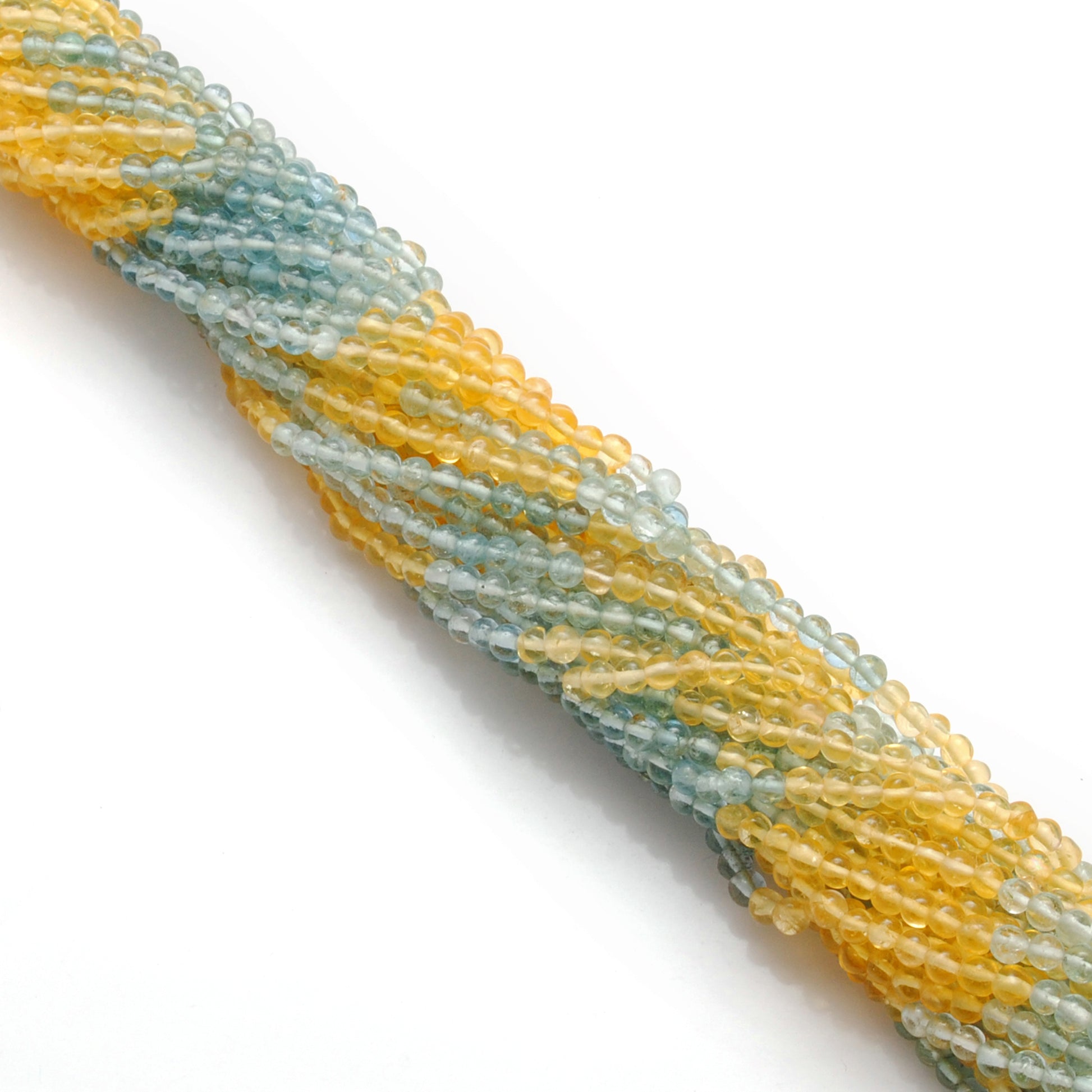 Natural multi aquamarine tiny beads strand 15 inch - overhead flat lay