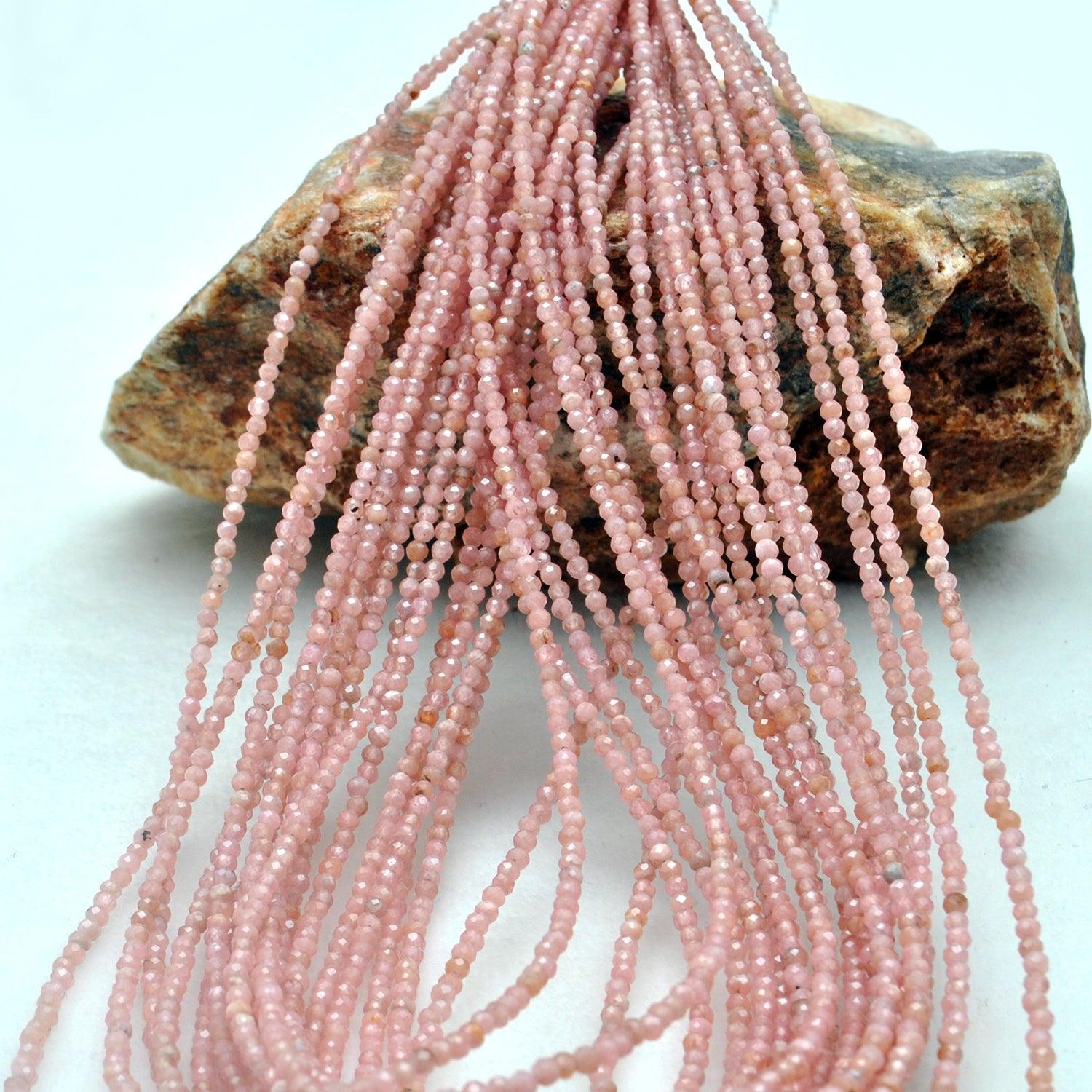 Natural peach moonstone beads scattered loose - warm peachy range