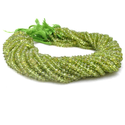 Natural peridot button beads 15 inch strand - overhead flat lay