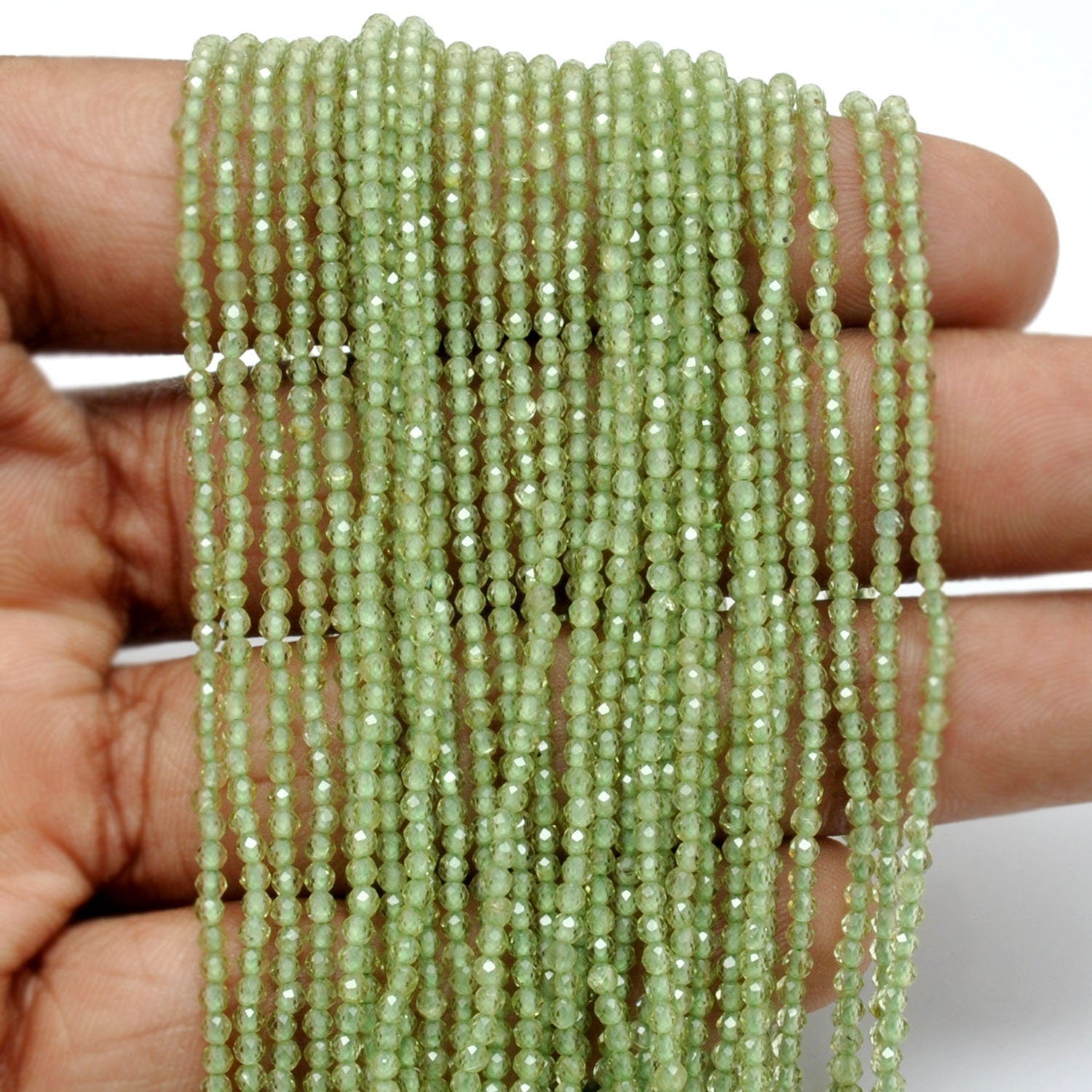 Natural peridot round beads 12.5 inch strand - overhead flat lay