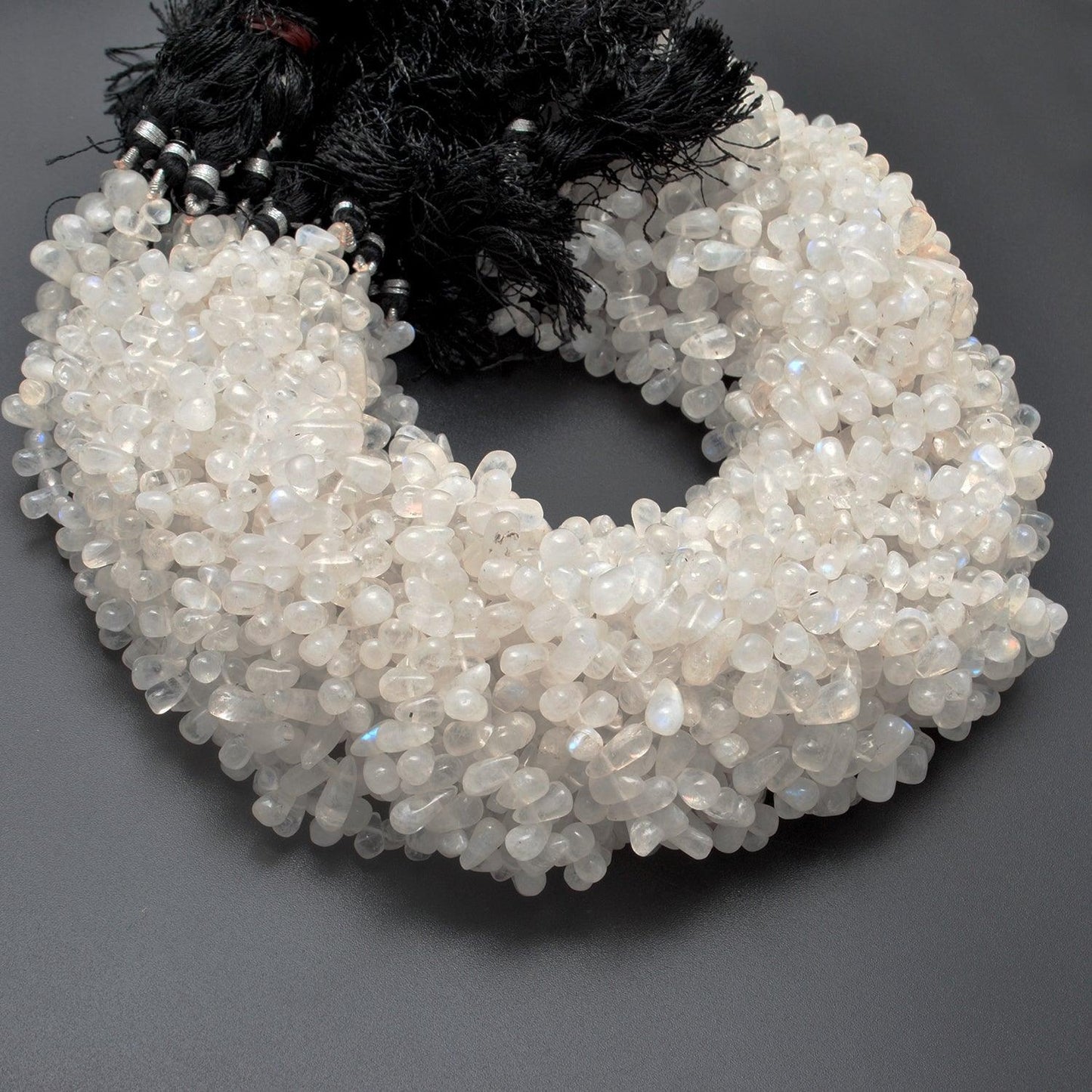 Natural rainbow moonstone drop beads strand side profile