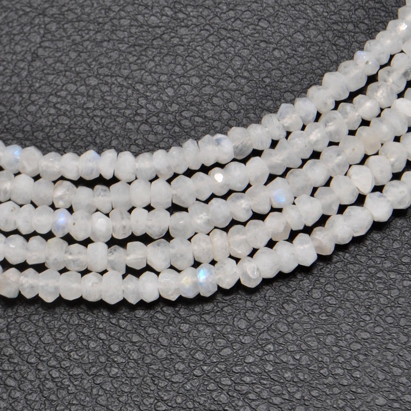 Natural rainbow moonstone rondelle beads strand - front view blue flash