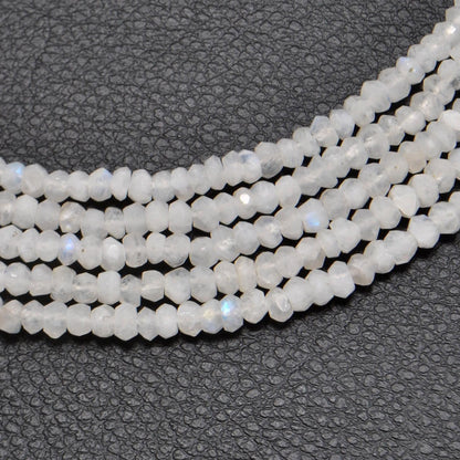 Natural rainbow moonstone rondelle beads strand - front view blue flash