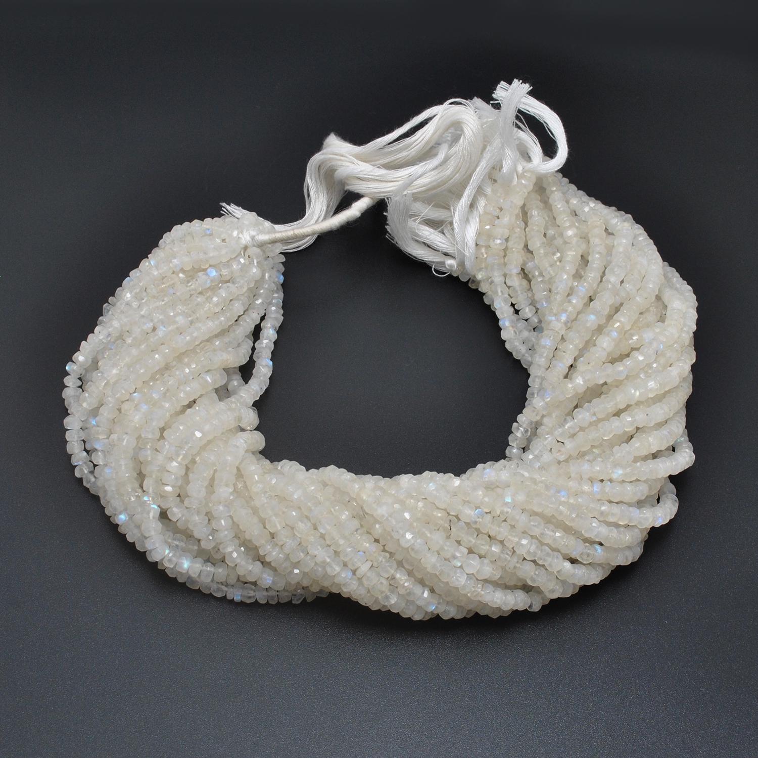 Natural rainbow moonstone rondelle strand - overhead flat lay