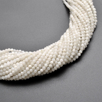 Natural rainbow moonstone round beads 13 inch - overhead flat lay