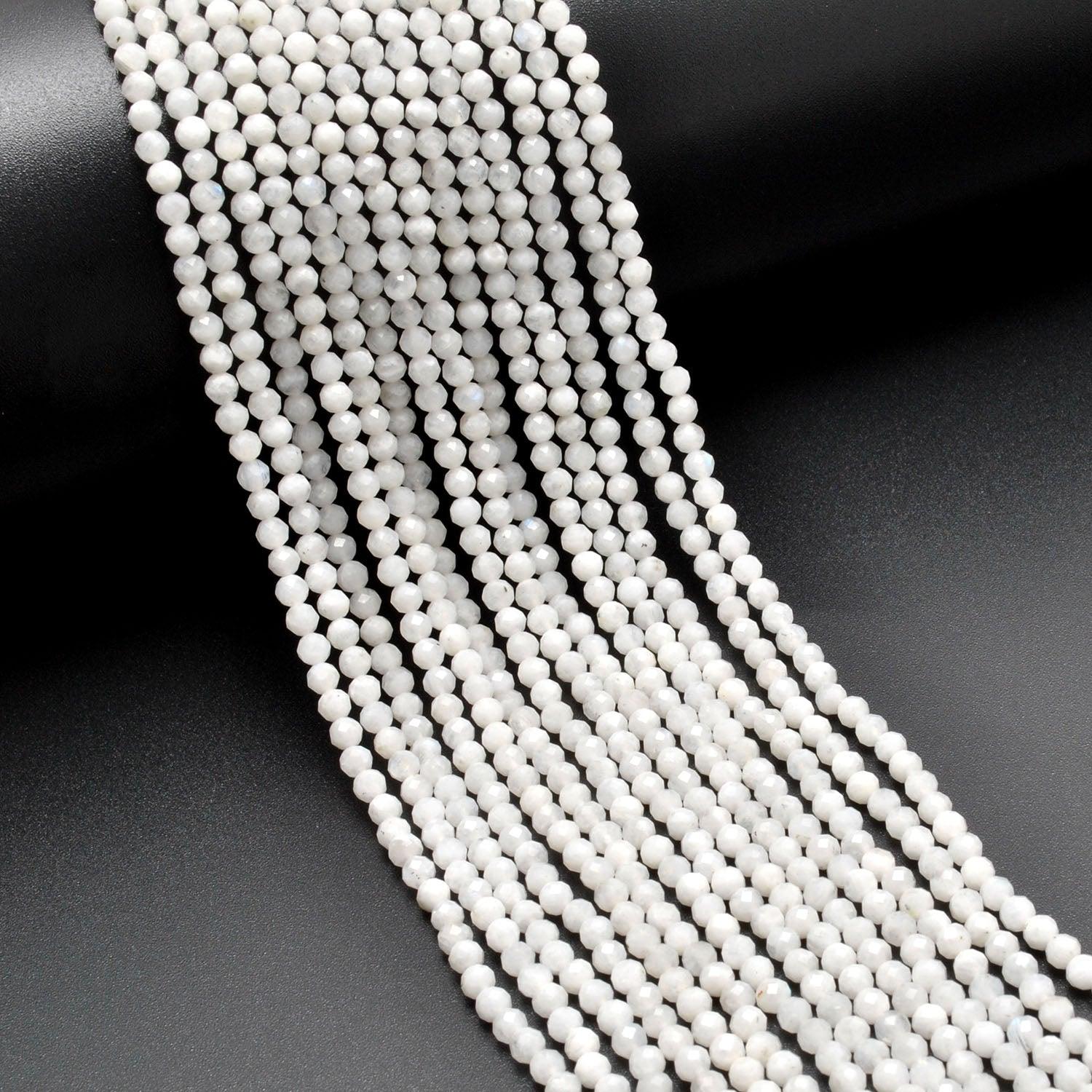 Natural rainbow moonstone round faceted wholesale strand - Jaipur