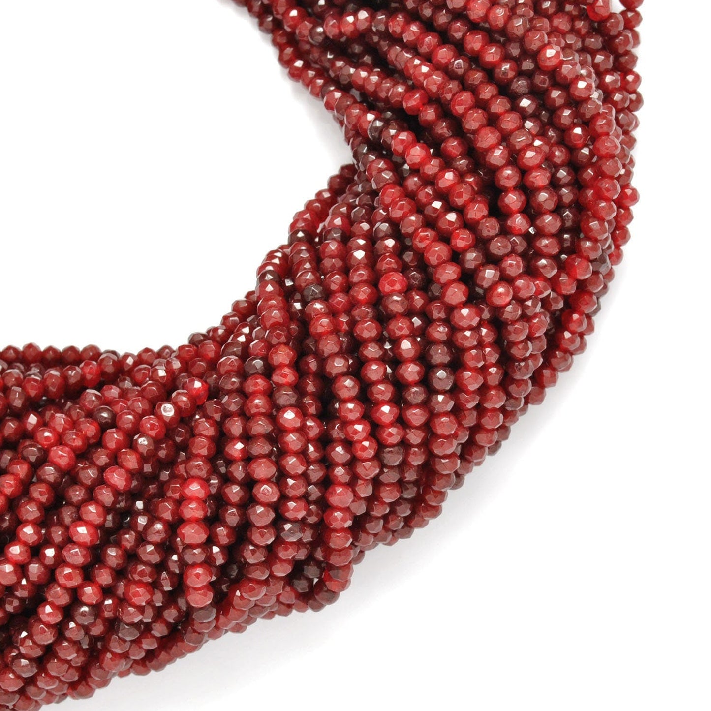 Red ruby rondelle beads 13 inch strand overhead flat lay