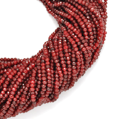 Red ruby rondelle beads 13 inch strand overhead flat lay