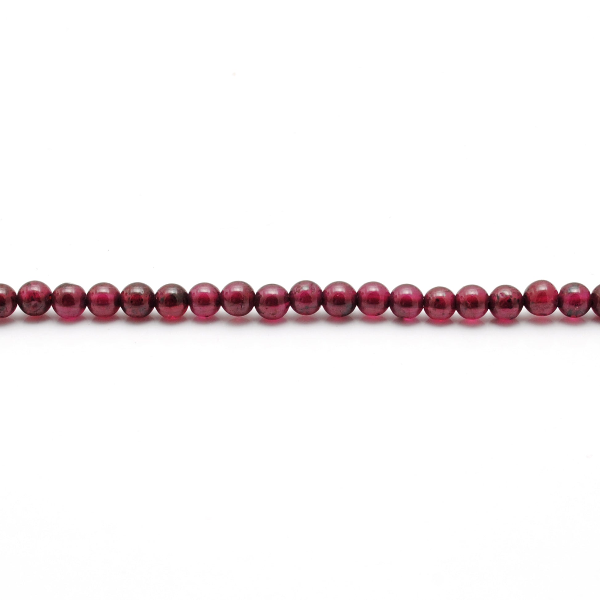 Natural rhodolite garnet round beads knotted strand view