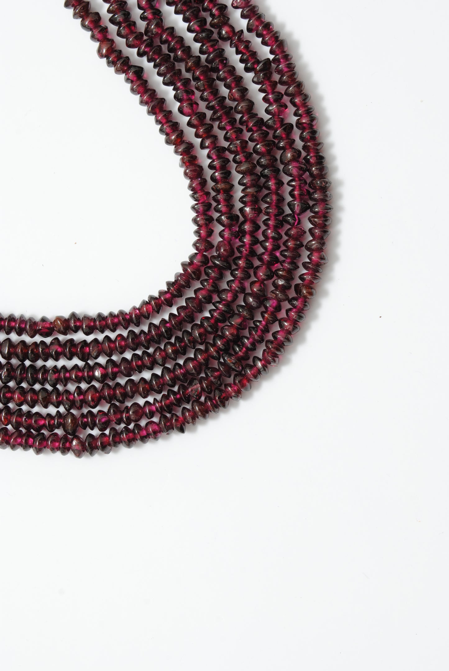Rhodolite garnet button beads 14-16 inch strand - overhead flat lay