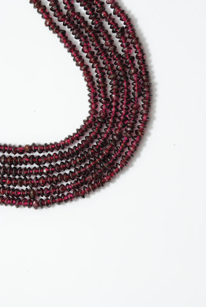 Rhodolite garnet button beads 14-16 inch strand - overhead flat lay