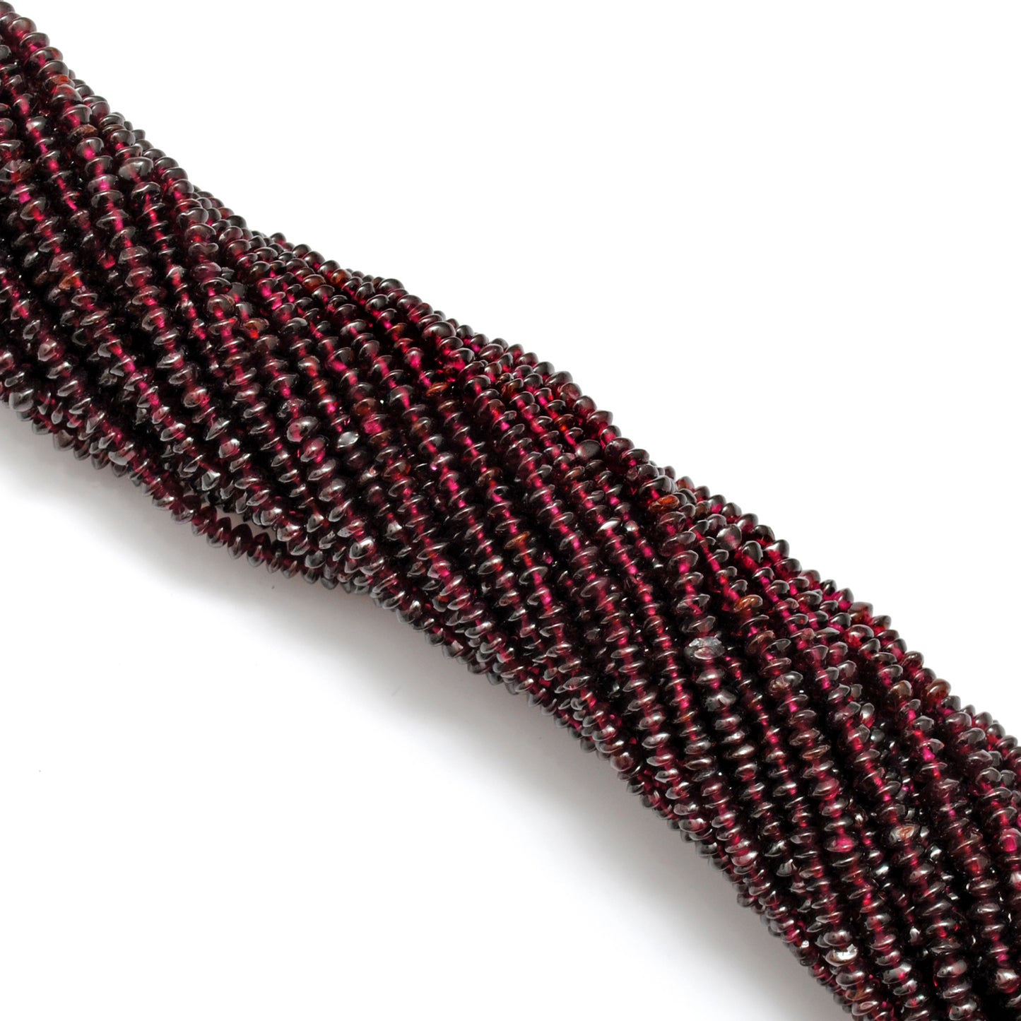 Rhodolite garnet button beads detail shot - rosy pinkish-red colour