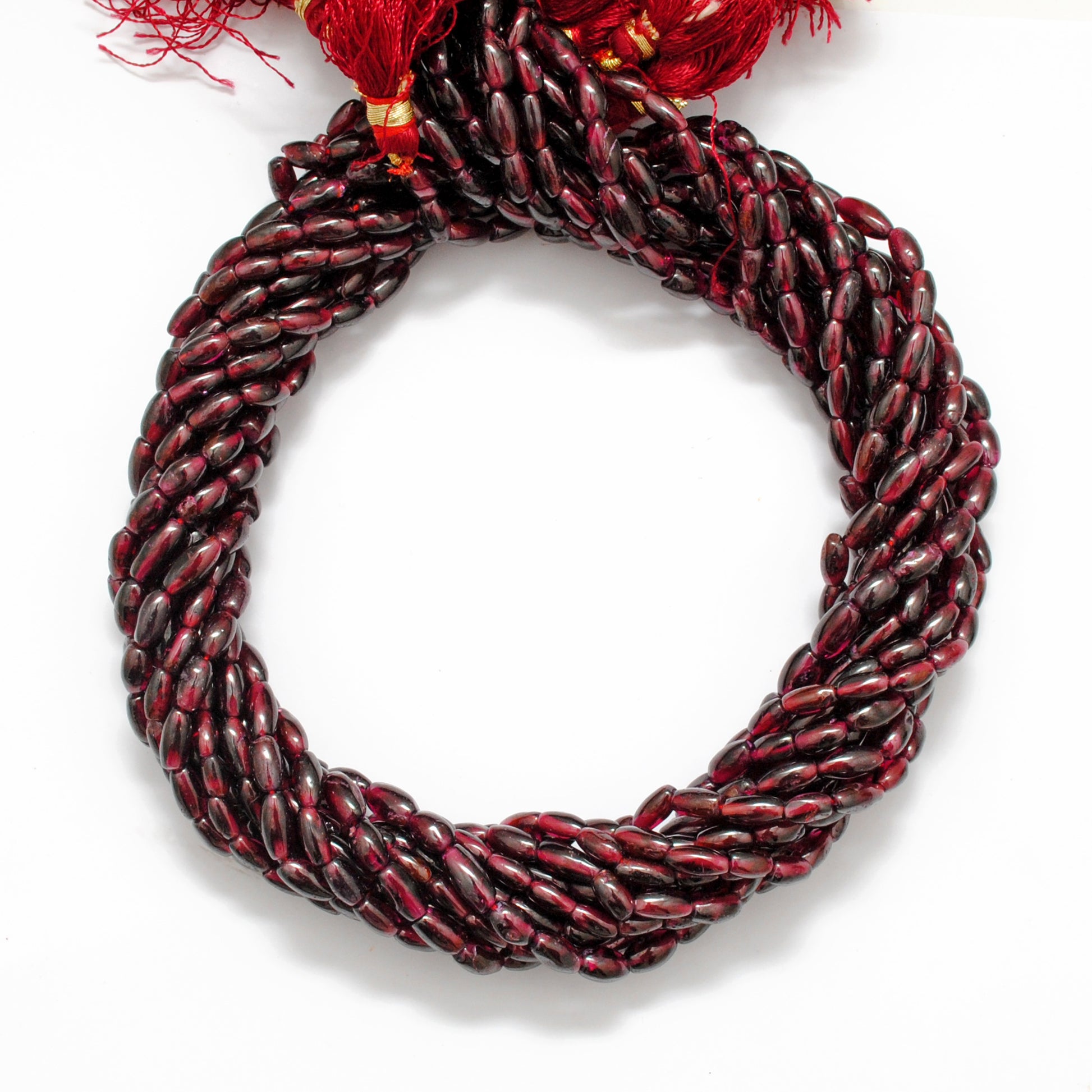 Natural rhodolite garnet drum beads strand side profile