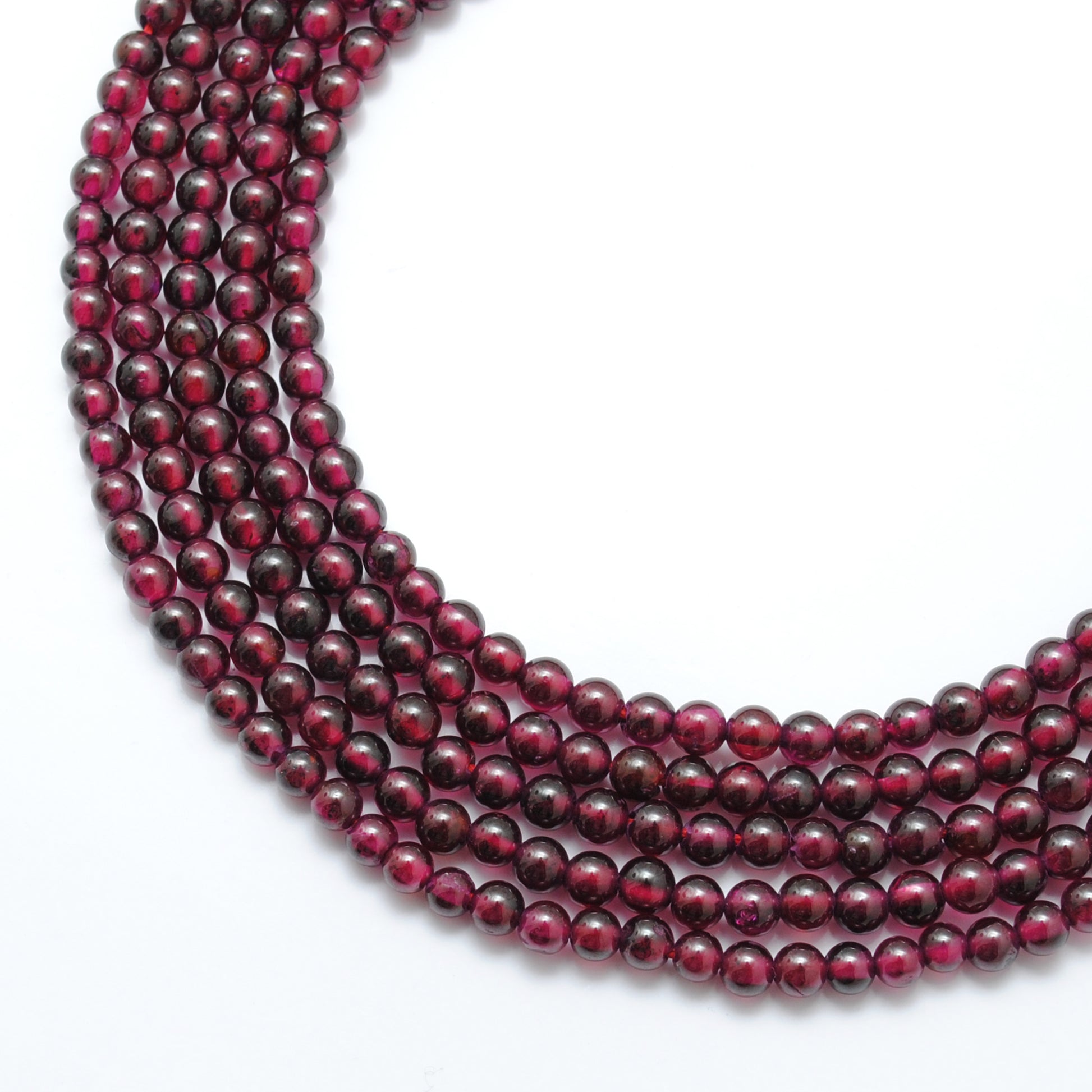 Rhodolite garnet round beads 14 inch strand - scale reference