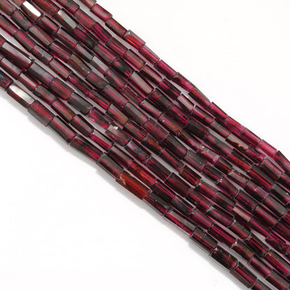 Rhodolite garnet tube beads 17 inch strand overhead flat lay