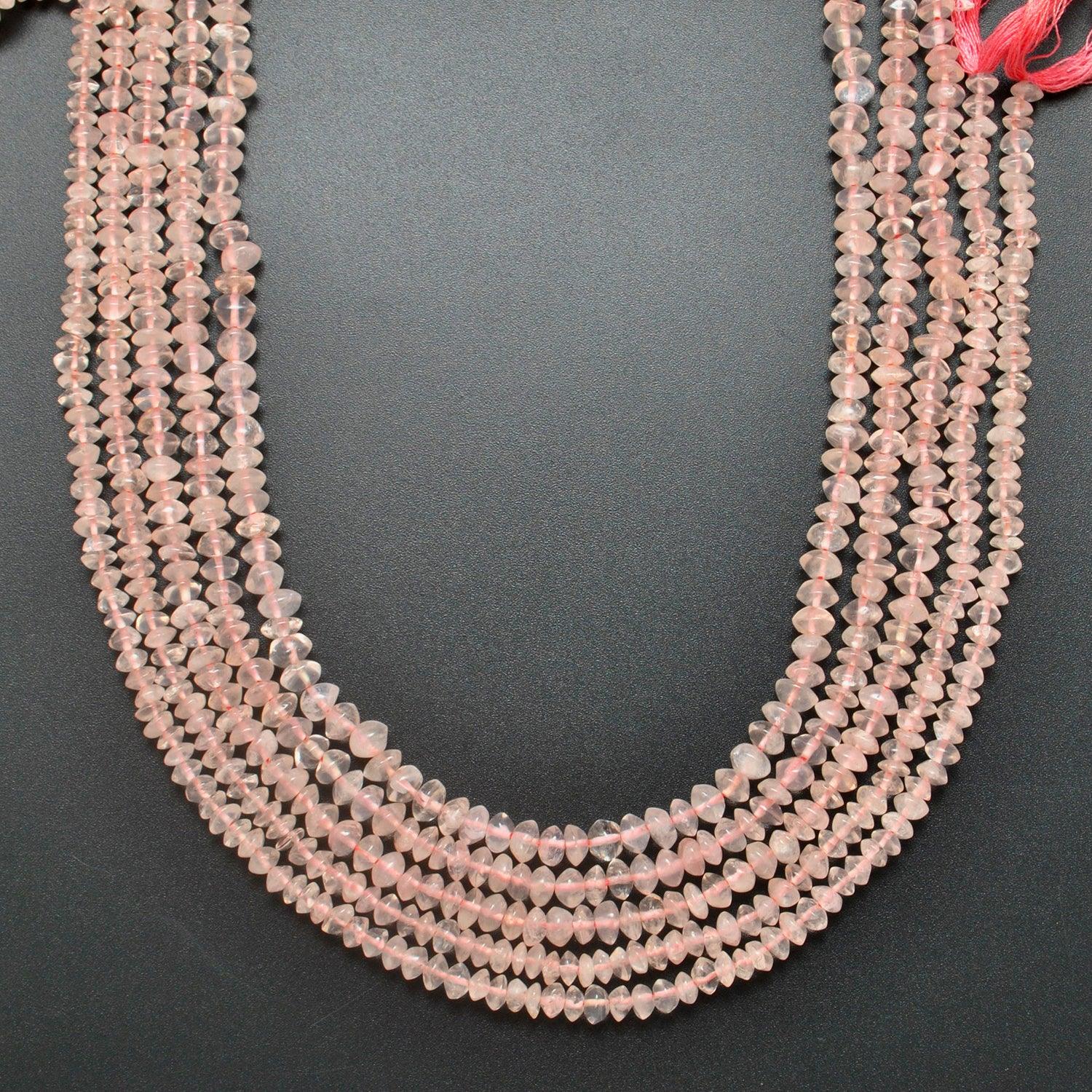 Natural rose quartz button beads strand side profile