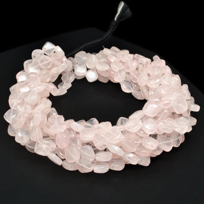 Rose quartz plain cushion beads 17 inch strand overhead flat lay