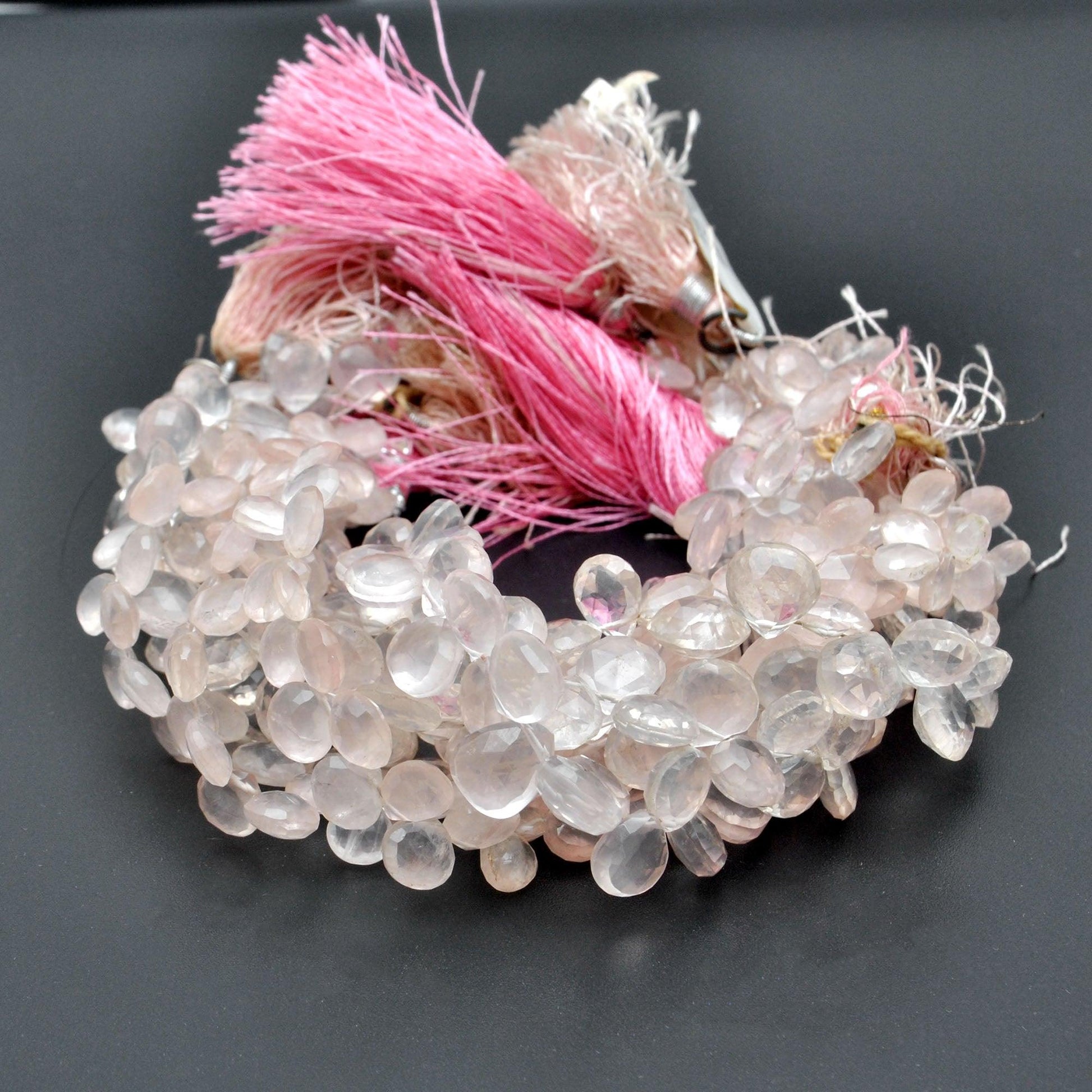Natural rose quartz heart beads strand side profile