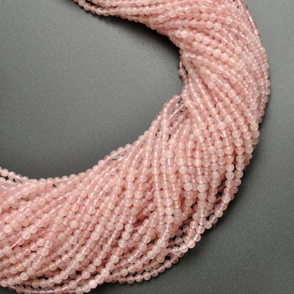 Natural rose quartz plain round gemstone beads strand - front view