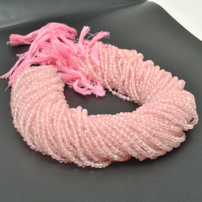 Natural rose quartz round beads strand side profile