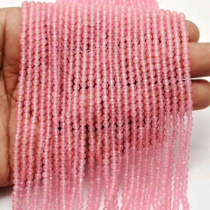 Natural rose quartz round faceted beads strand side profile