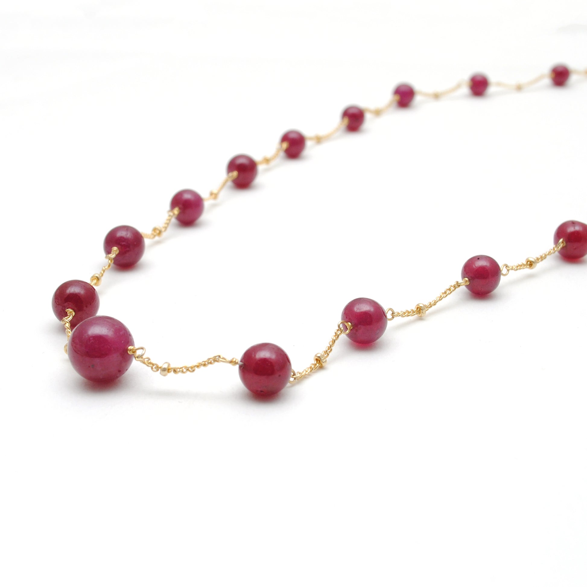 Natural Ruby Ball Bead Gold Necklace - Overhead View Gemstone