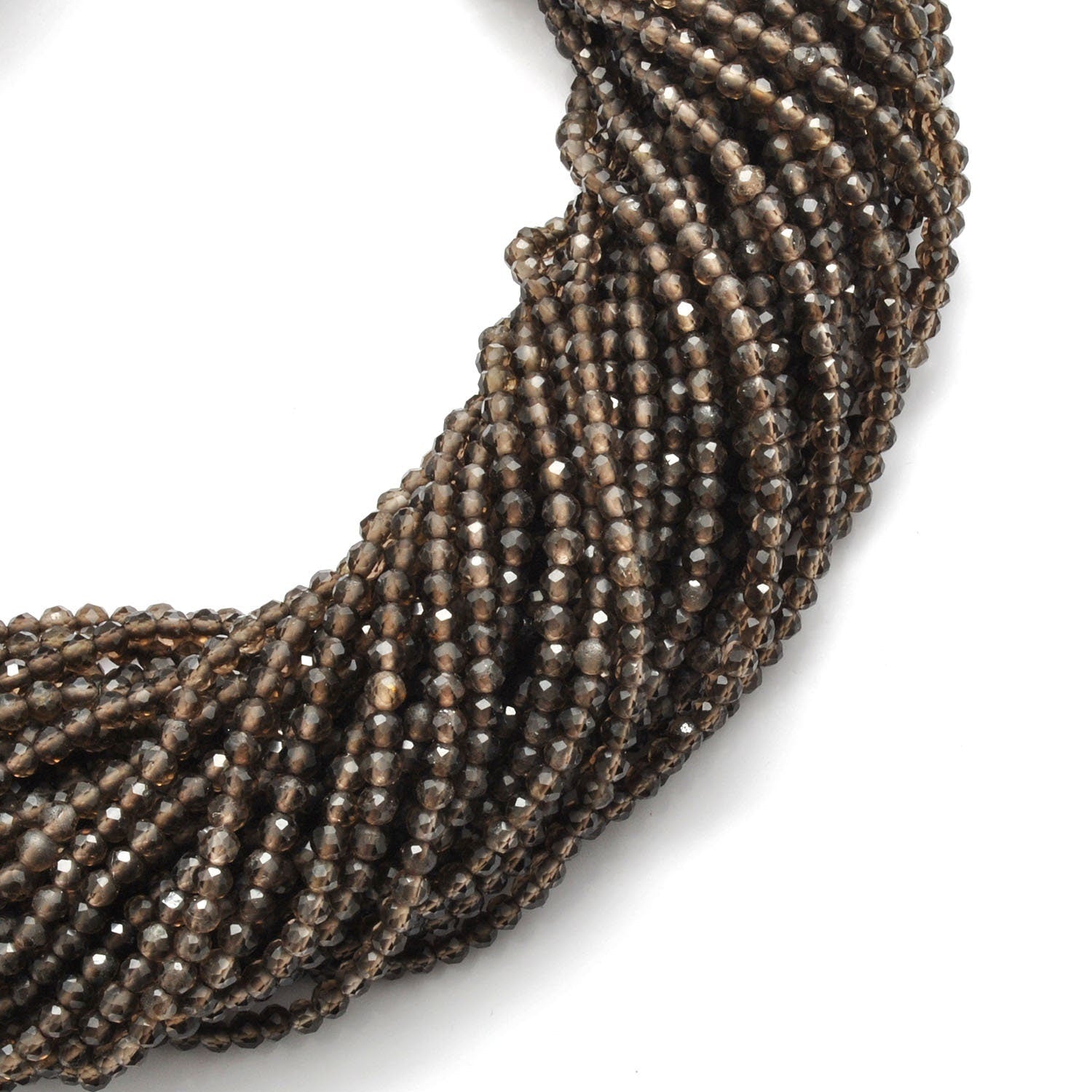 Smokey quartz round faceted beads 12.5 inch strand overhead flat lay