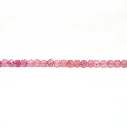 Natural strawberry quartz round faceted beads Jaipur wholesale scale reference